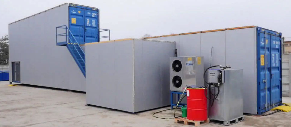 The thermal decomposition of a selected segment of waste materials in the containerised solution.